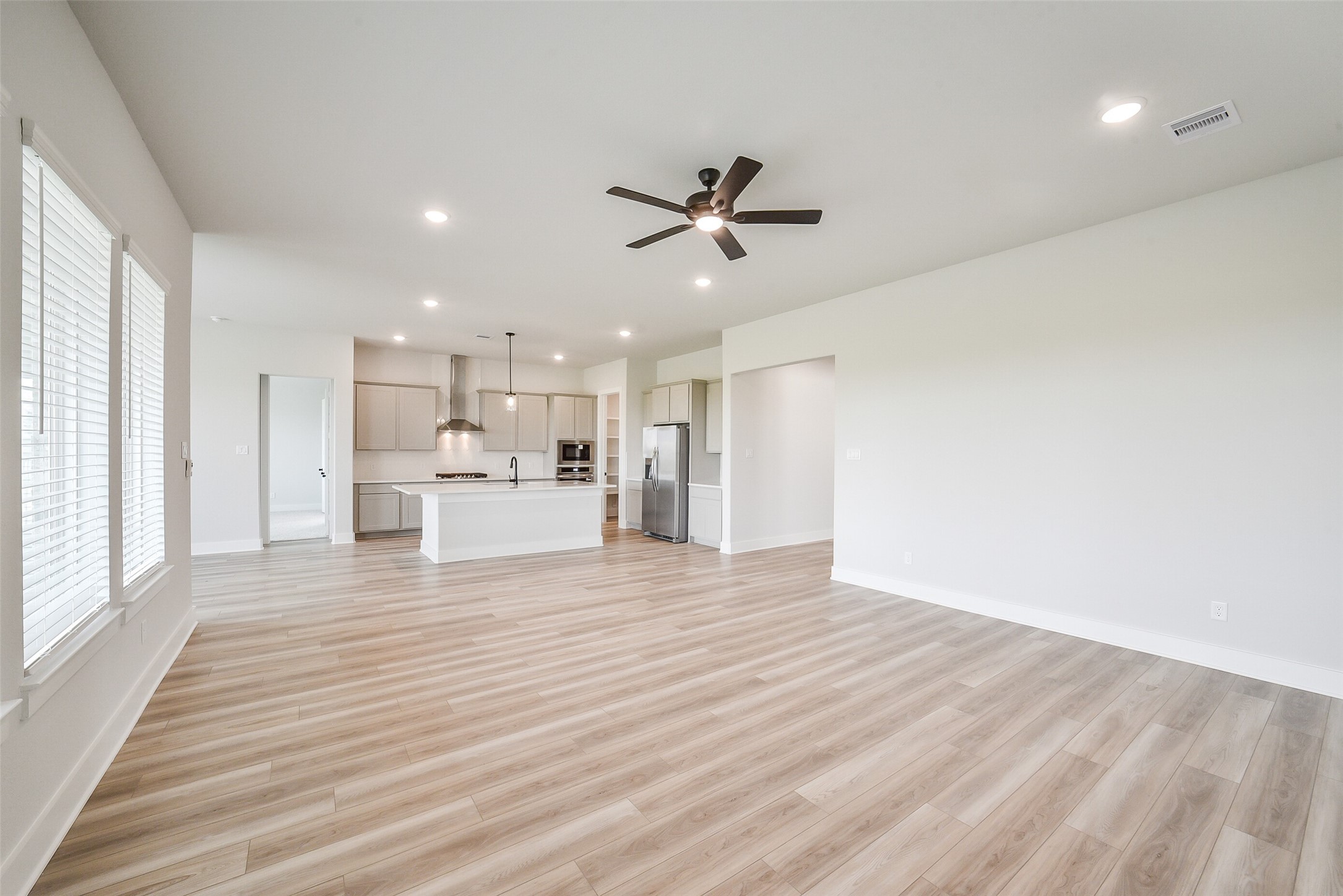 1831 Tioga Vw Drive Rosharon, TX 77583 - Photo 29 of 50 a view of a kitchen with wooden floor and a kitchen