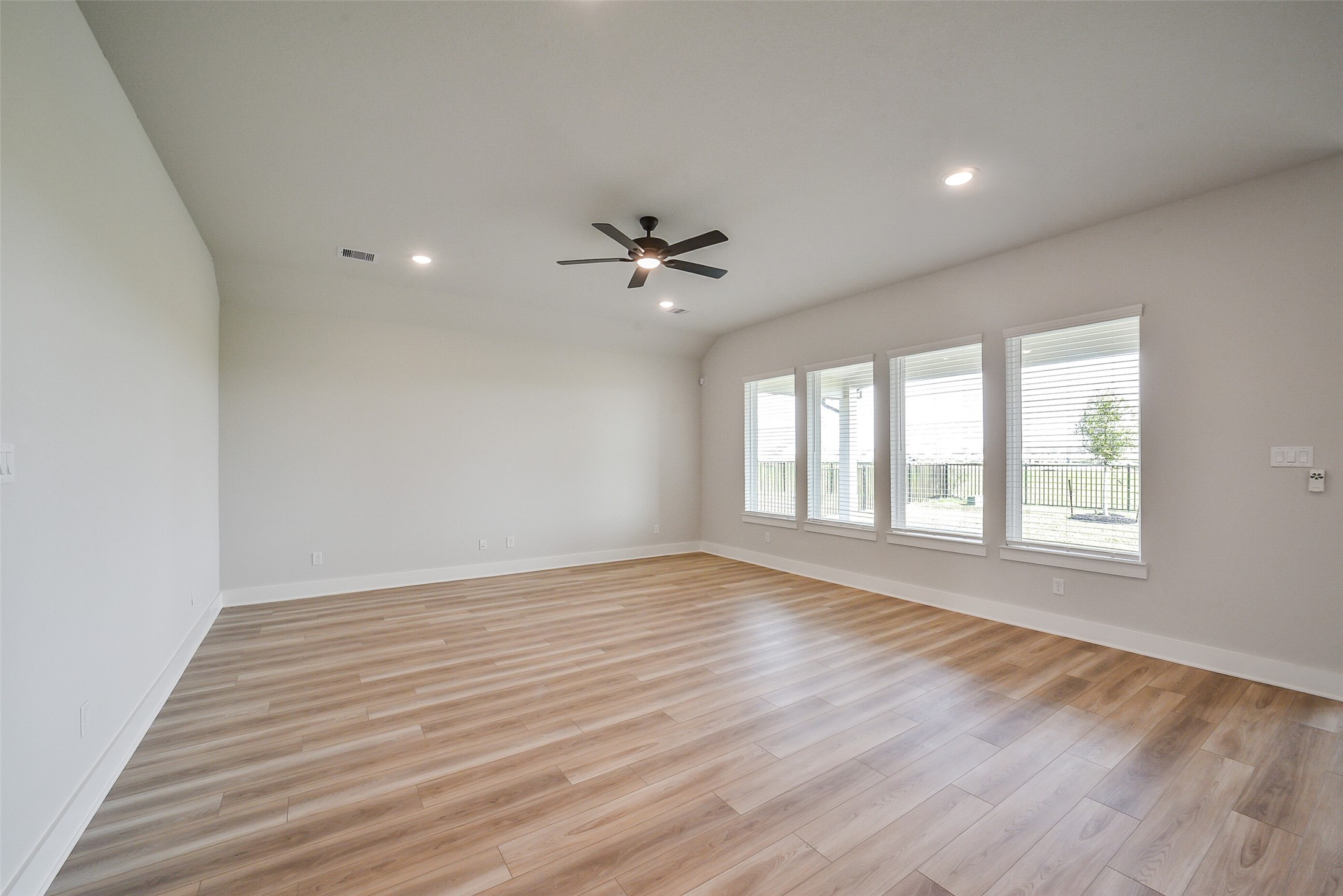 1831 Tioga Vw Drive Rosharon, TX 77583 - Photo 31 of 50 wooden floor in an empty room with a window