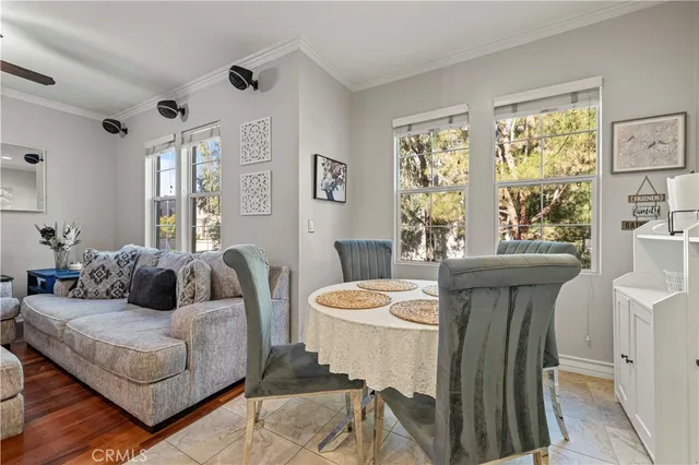 a bathroom with a granite countertop sink mirror and toilet