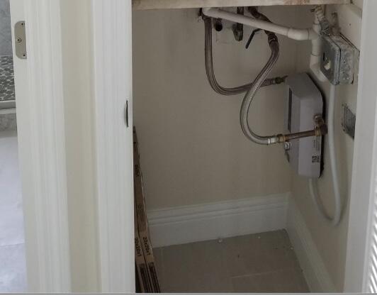 461 Burgundy North Delray Beach, FL 33484 - Photo 6 of 8 Tankless Hot Water Heater