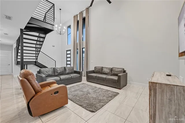 a living room with furniture and a couch