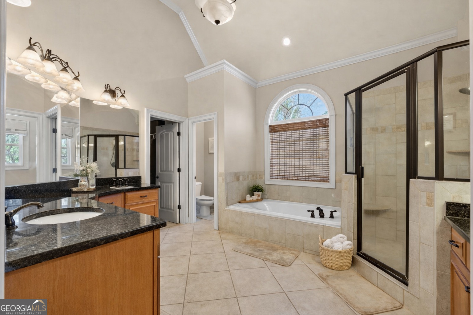 32 River Rapids Drive Forsyth, GA 31029 - Photo 19 of 32 a spacious bathroom with a tub sink and mirror