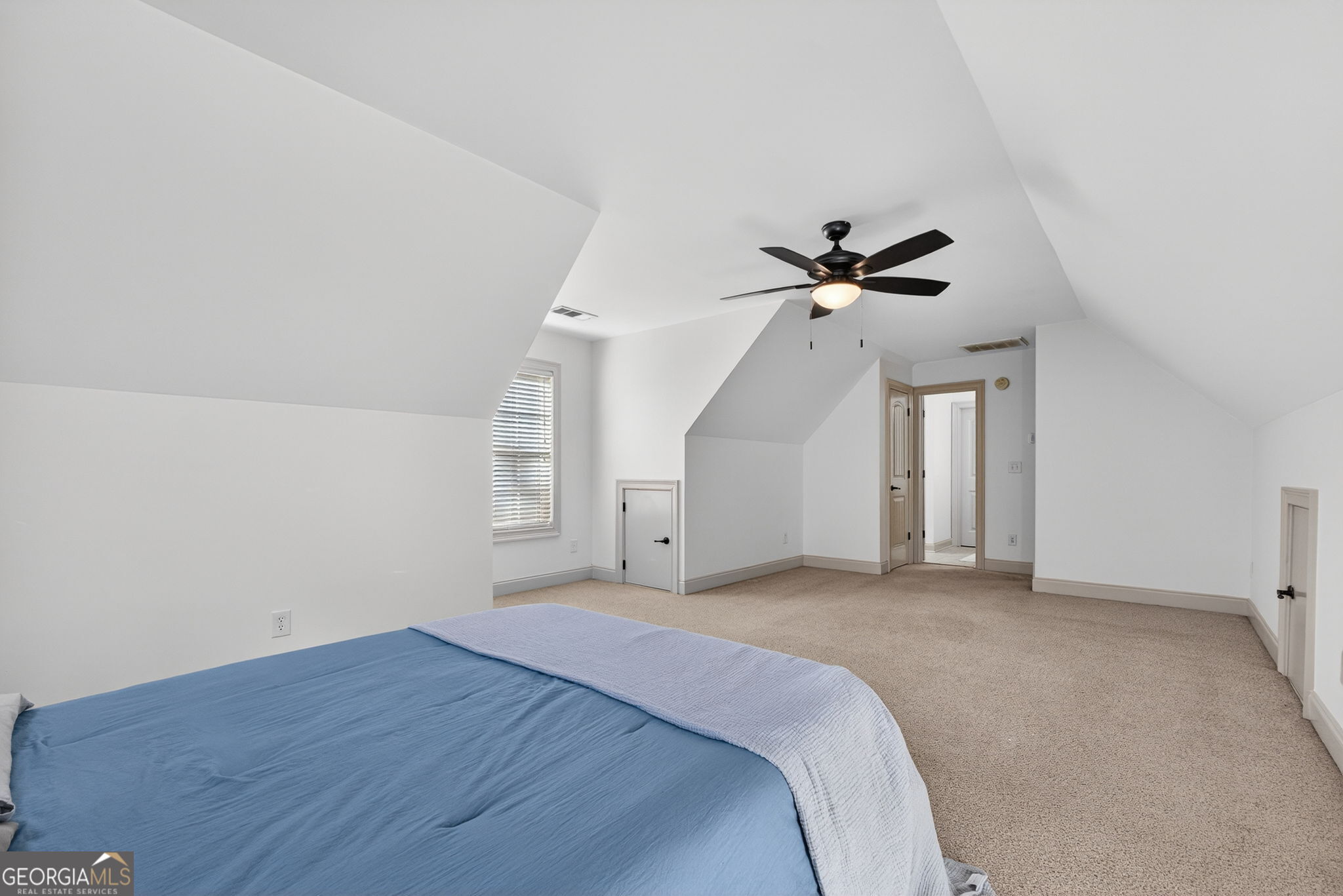 32 River Rapids Drive Forsyth, GA 31029 - Photo 25 of 32 a view of a livingroom with a ceiling fan