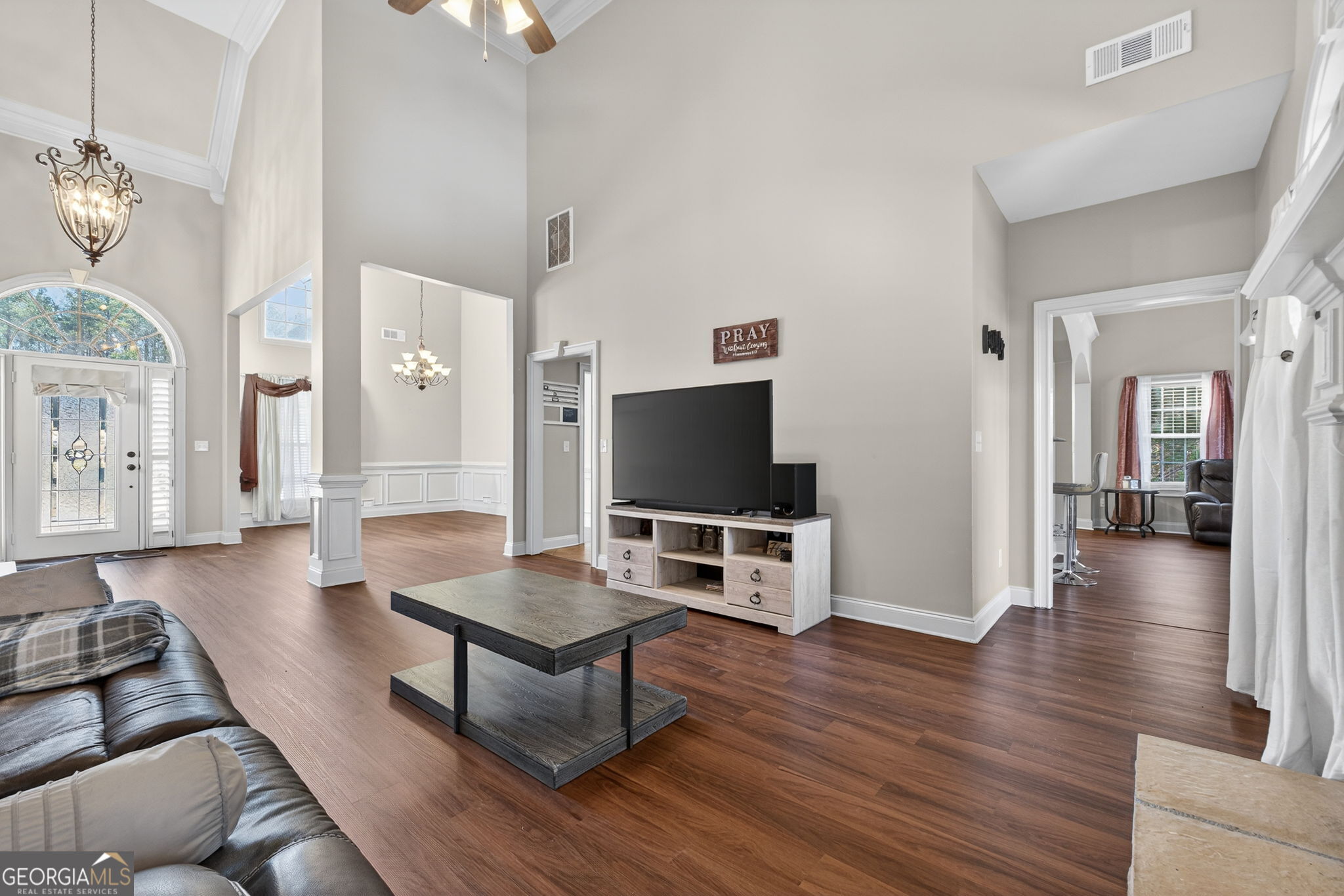 32 River Rapids Drive Forsyth, GA 31029 - Photo 6 of 32 a living room with furniture and a flat screen tv