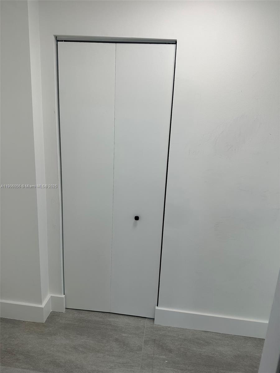 5280 Northwest 7th Street, Unit 306 Miami, FL 33126 - Photo 16 of 23 a view of a small space