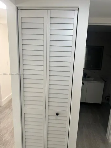 a view of an empty walk in closet