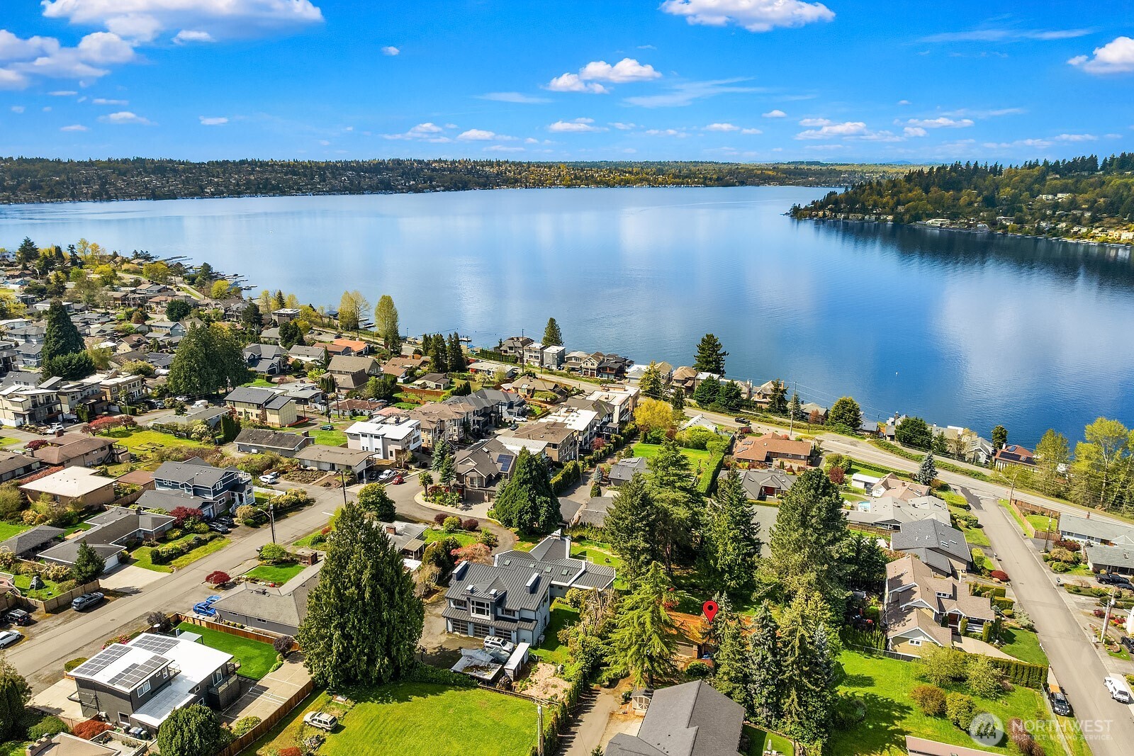 3737 Park Avenue North Renton, WA 98056 - Photo 9 of 10 a view of a lake with a house