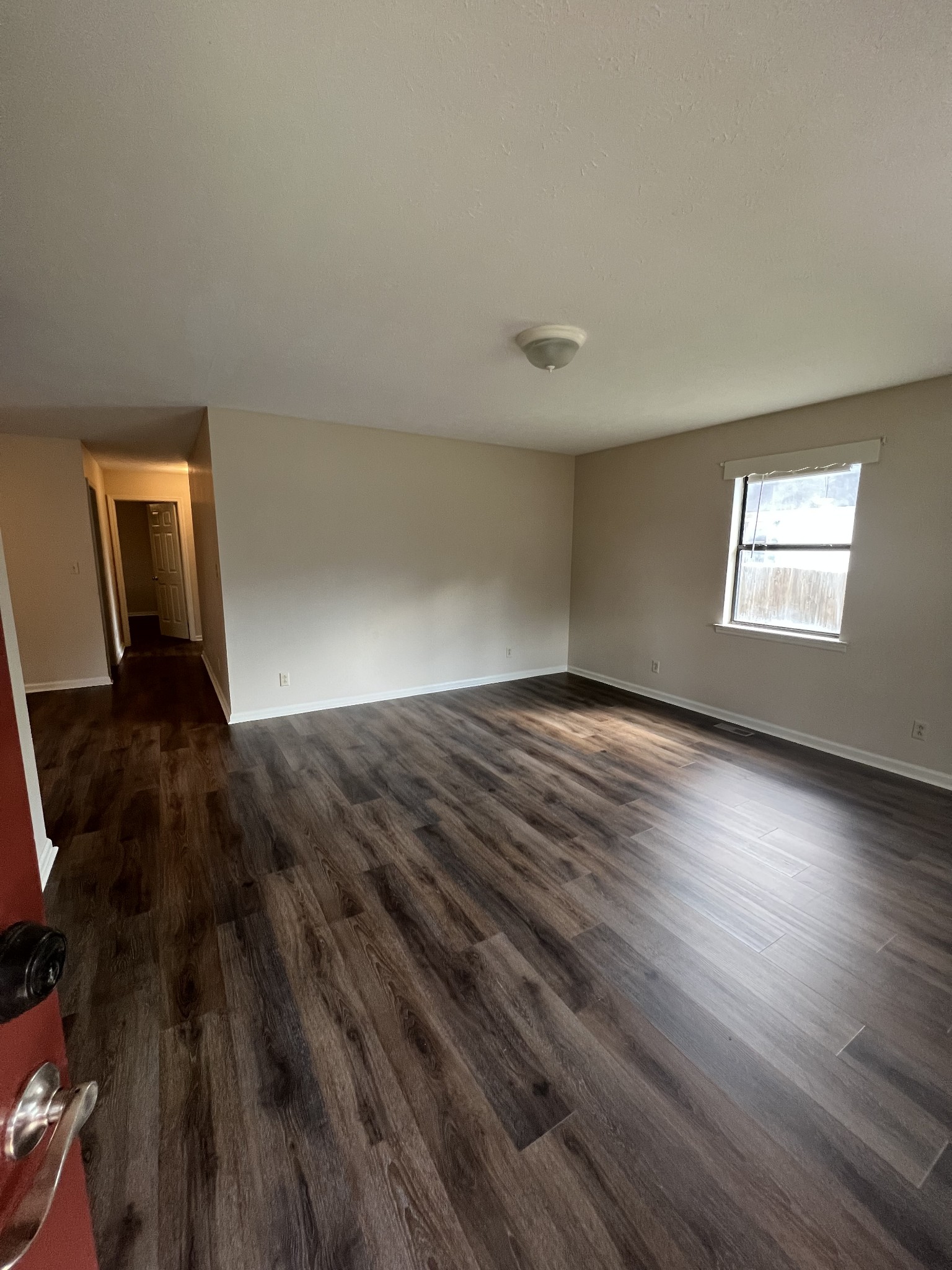 5012 Jacksboro Road Morrison, TN 37357 - Photo 4 of 13 a view of empty room with wooden floor and fan