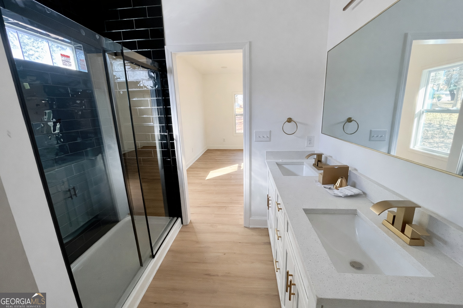 204 Custer Circle Griffin, GA 30223 - Photo 16 of 17 a bathroom with a sink and a tub