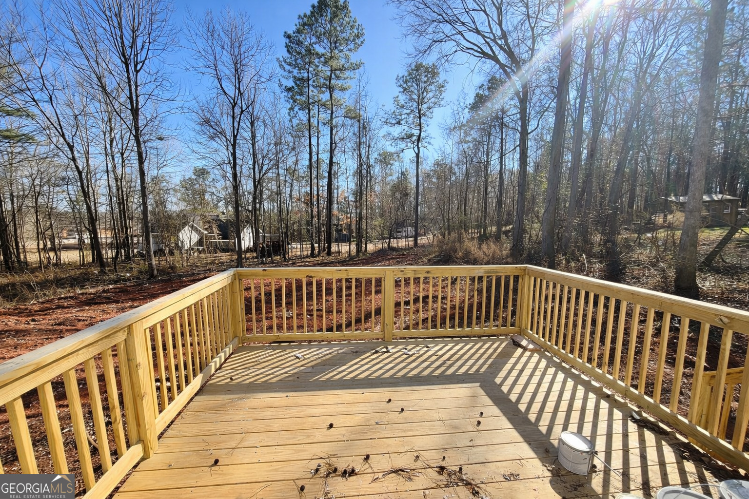 204 Custer Circle Griffin, GA 30223 - Photo 17 of 17 a view of deck with wooden fence and trees