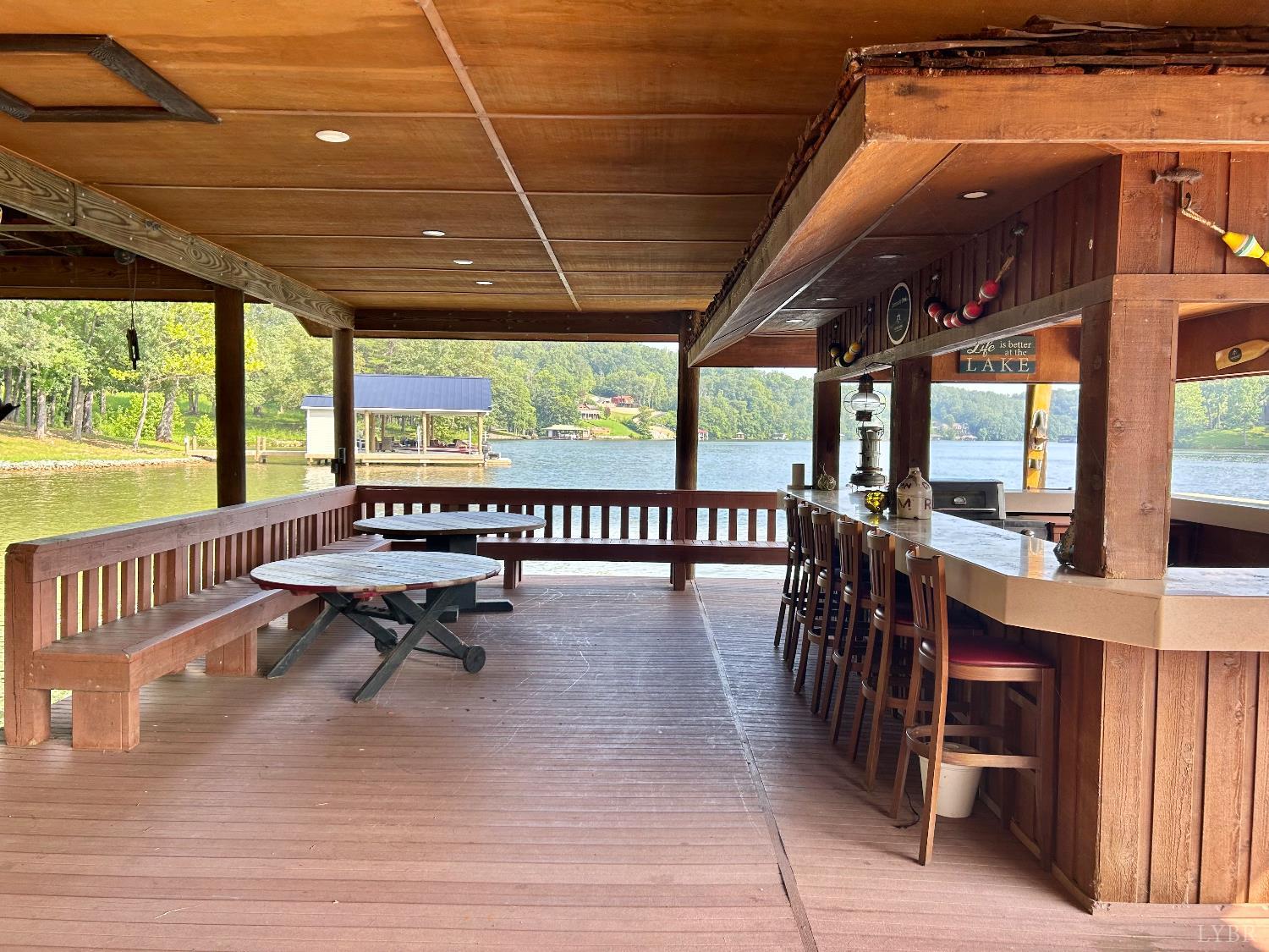 0 Crestview Road Wirtz, VA 24184 - Photo 7 of 18 a view of a porch with wooden floor and outdoor seating