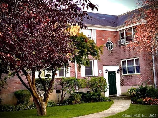 23 Standish Road, Unit 1 Stamford, CT 06902 - Photo 1 of 1 a front view of a house with garden