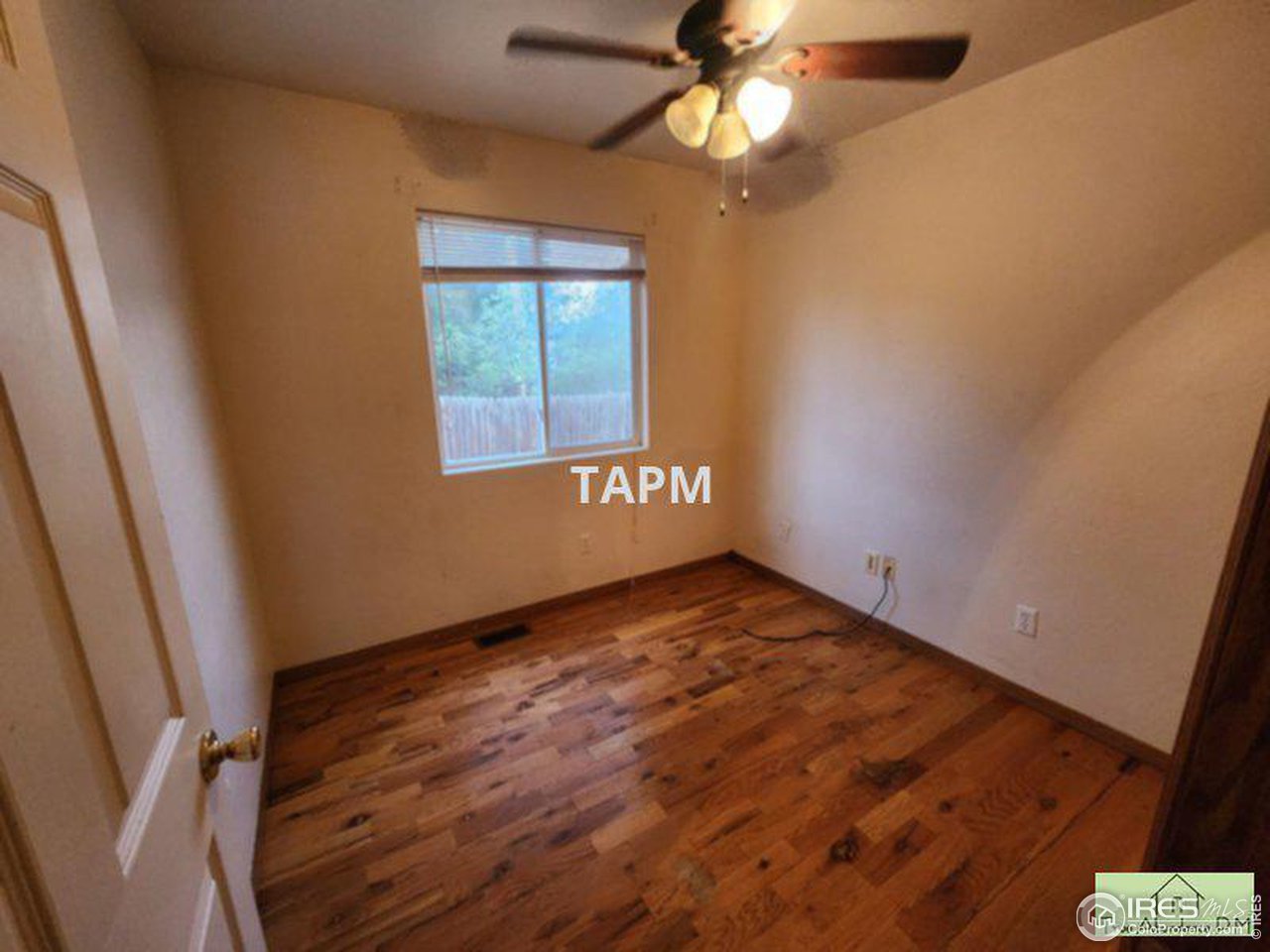 1317 Darrell Road Evans, CO 80620 - Photo 11 of 15 a view of an empty room and window