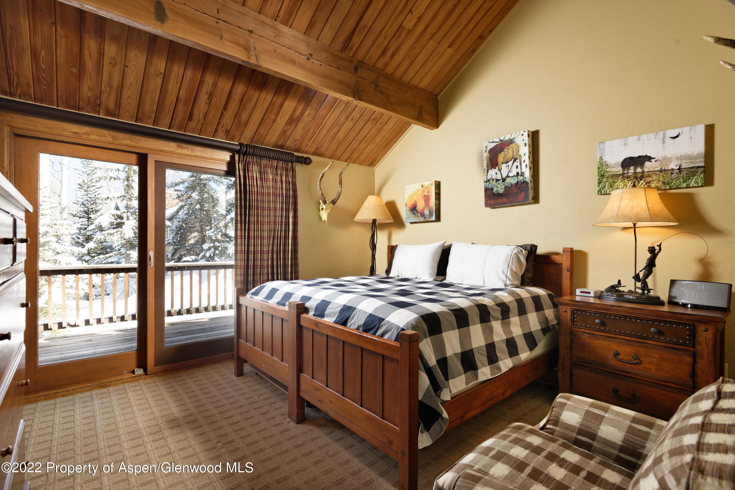 1400 Wood Road Snowmass Village, CO 81615 - Photo 17 of 36 a bedroom with a bed and window