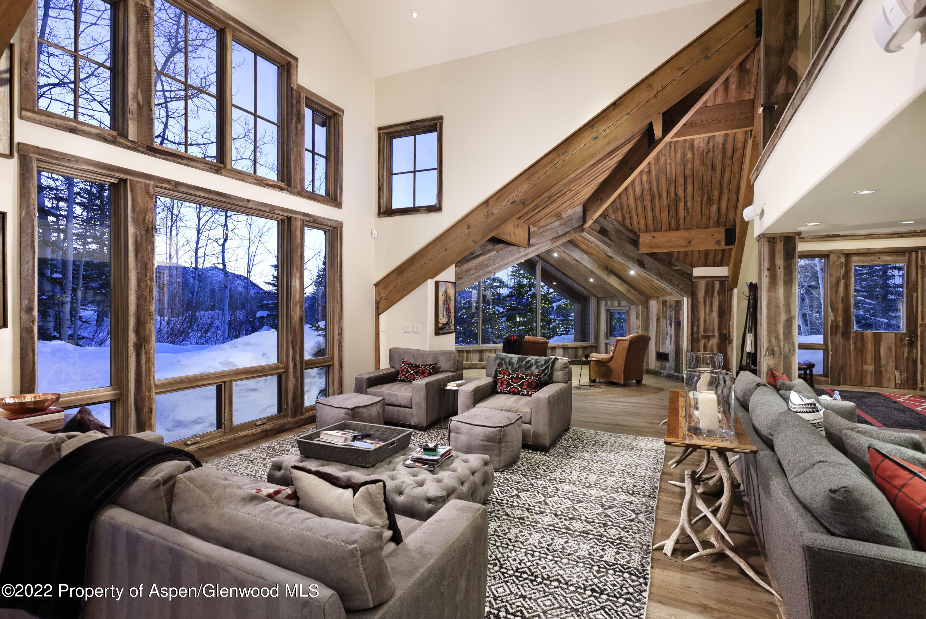 1400 Wood Road Snowmass Village, CO 81615 - Photo 26 of 36 a living room with furniture a rug and a window