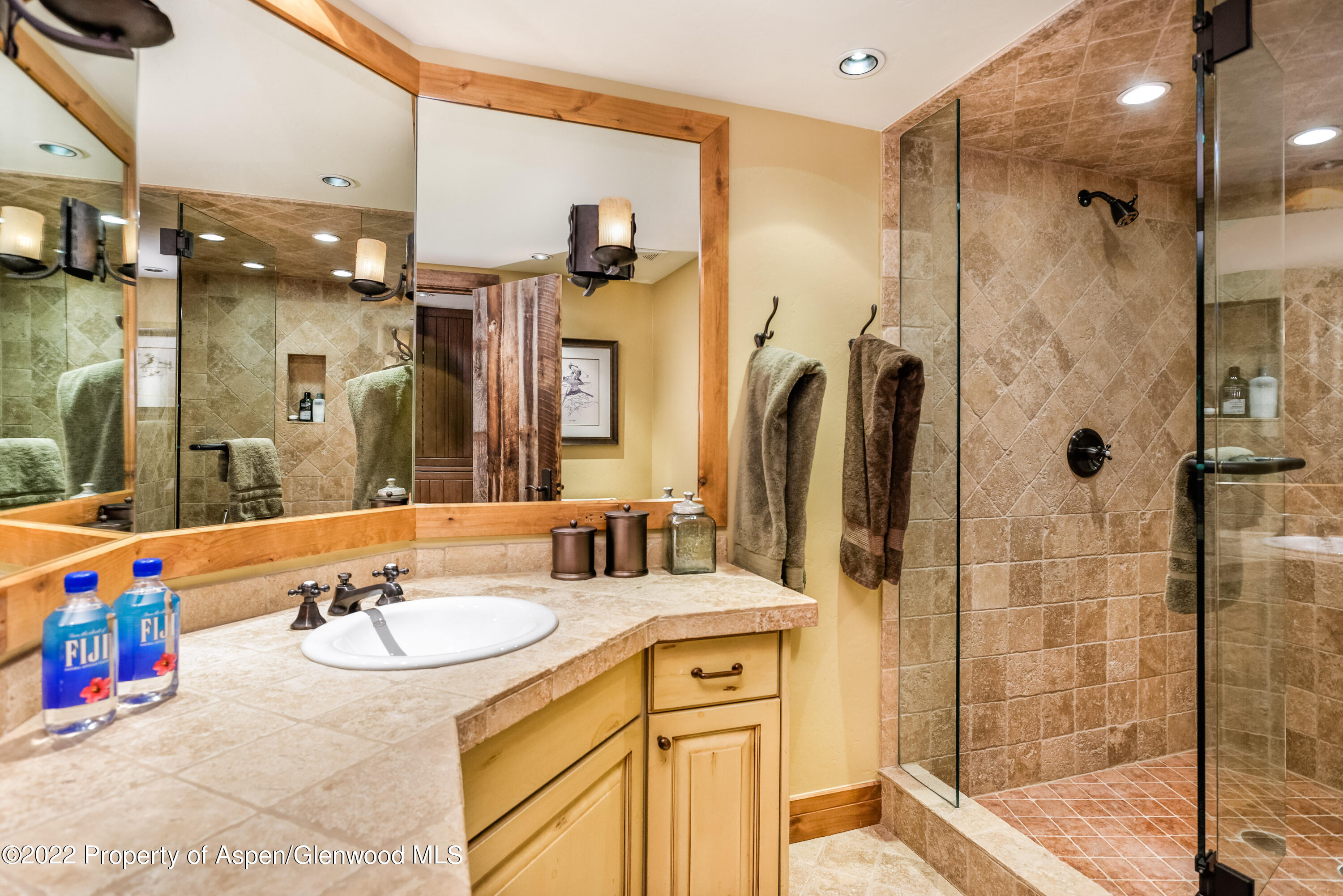 1400 Wood Road Snowmass Village, CO 81615 - Photo 31 of 36 a bathroom with a sink double vanity and shower