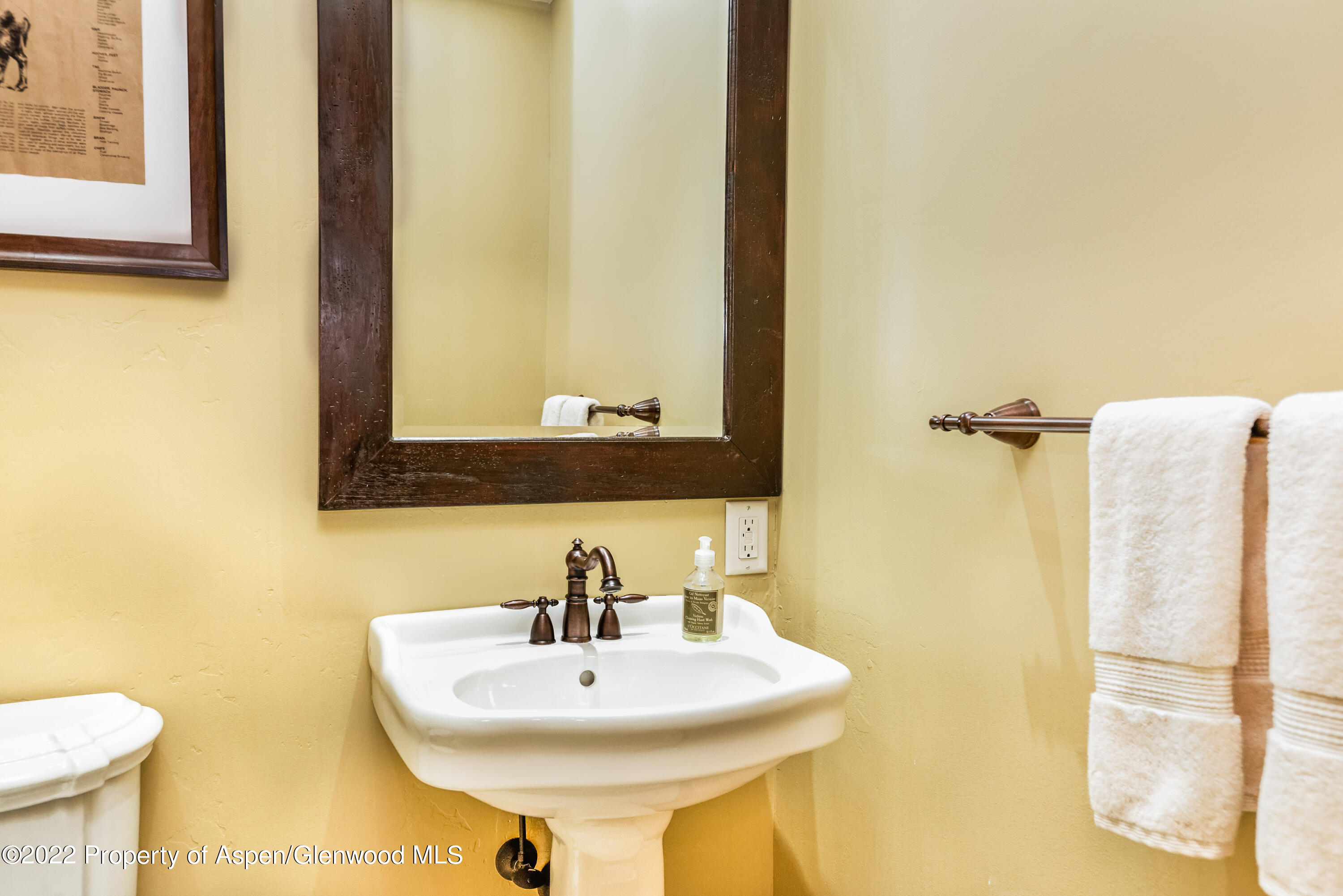 1400 Wood Road Snowmass Village, CO 81615 - Photo 32 of 36 a bathroom with a sink and a mirror