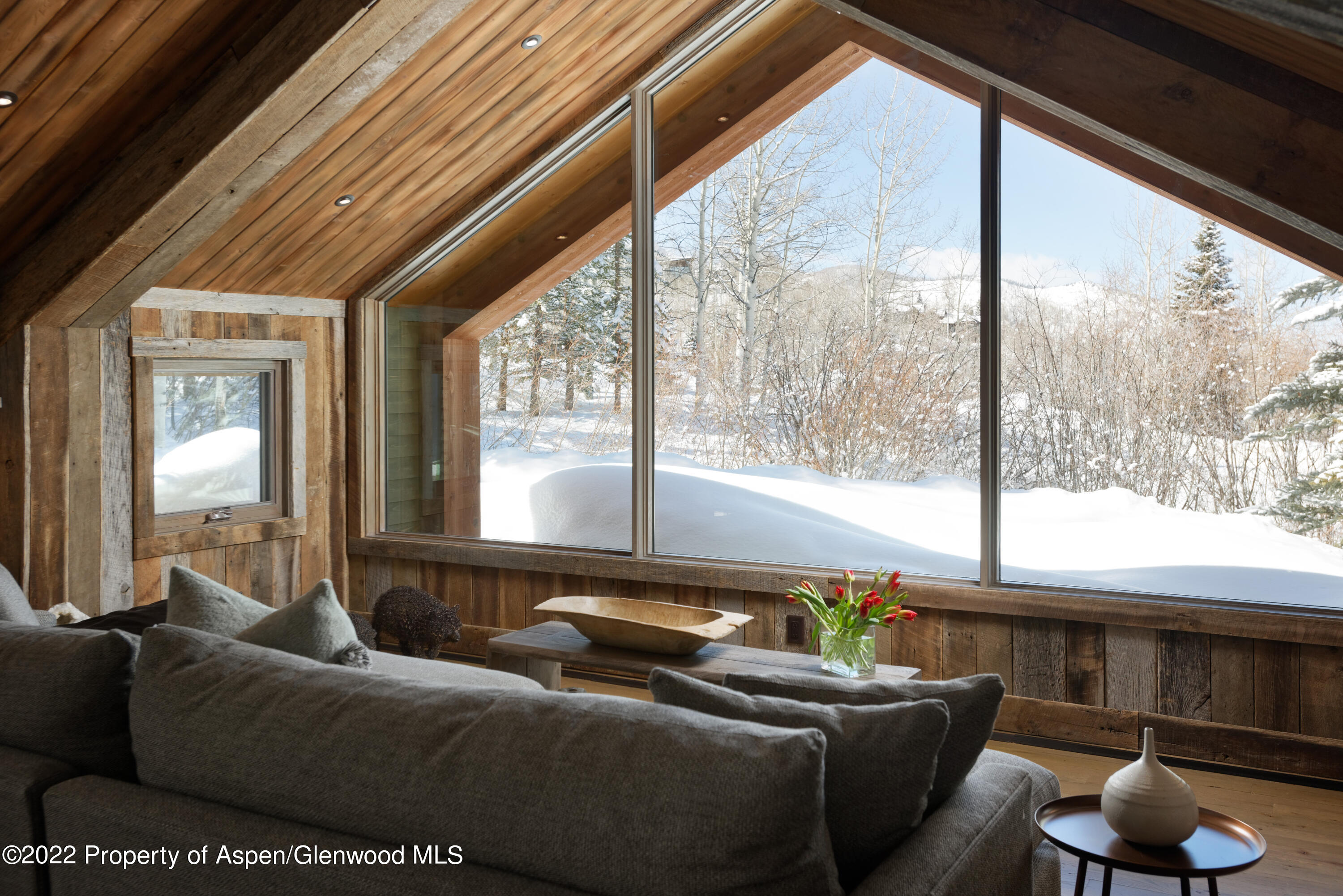 1400 Wood Road Snowmass Village, CO 81615 - Photo 6 of 36 a living room with furniture and a large window