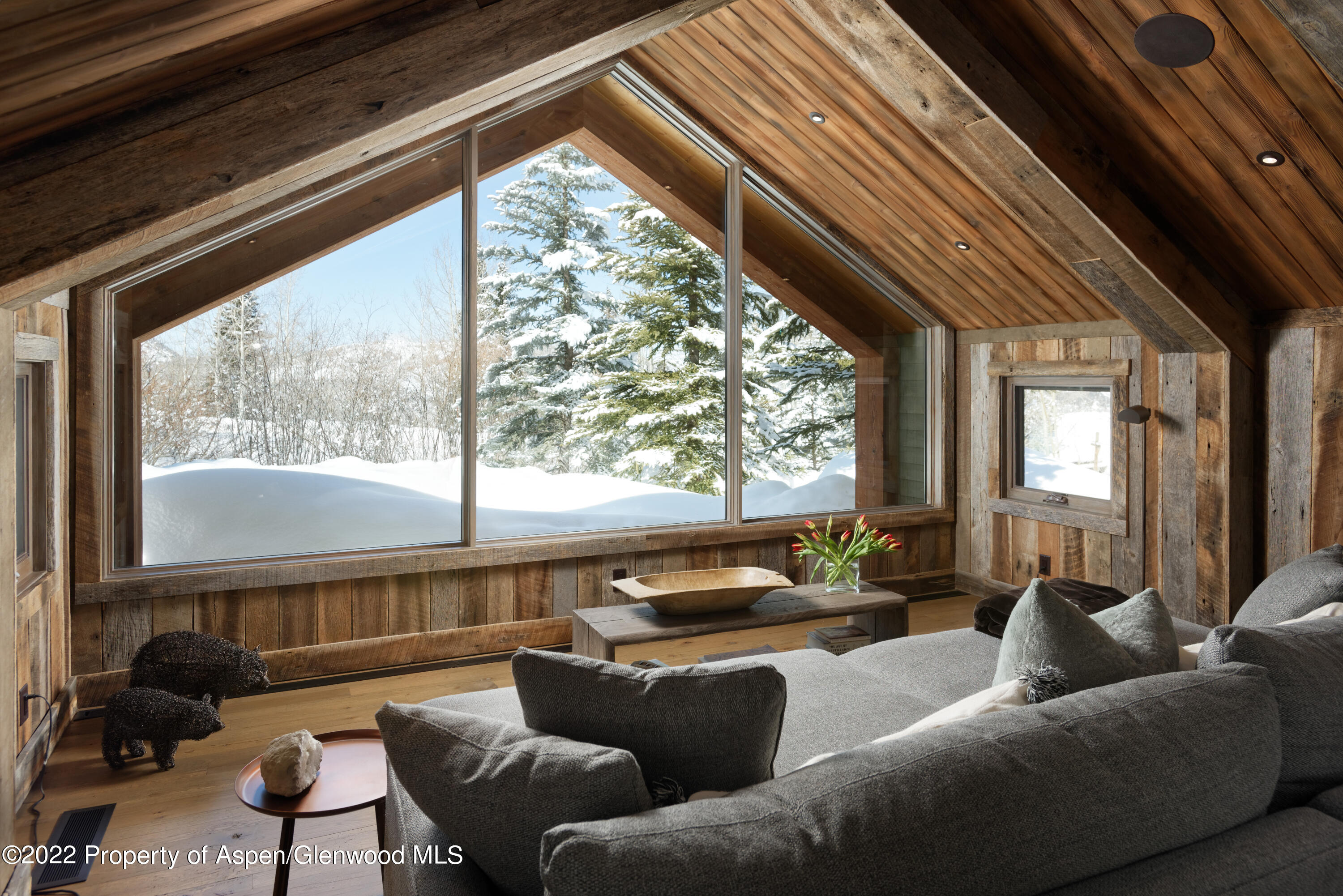 1400 Wood Road Snowmass Village, CO 81615 - Photo 7 of 36 a living room with furniture and a large window