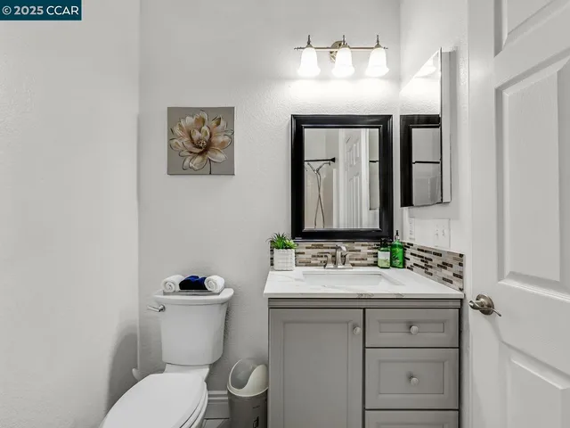 a view of a house with a yard and garage