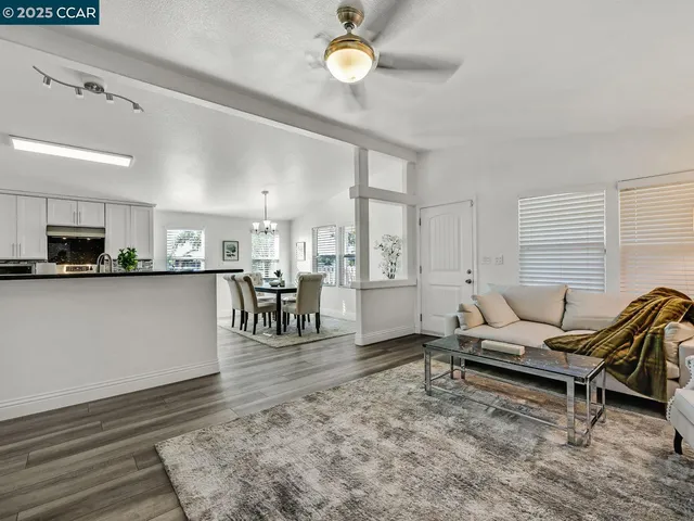 a view of a kitchen and dining table