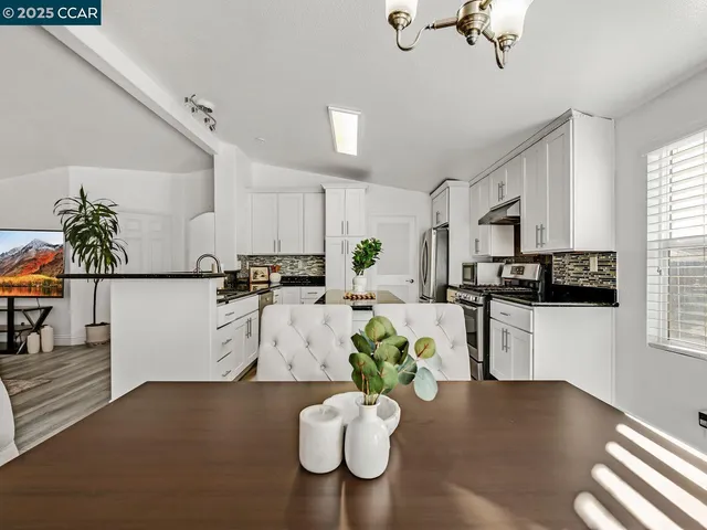 a bedroom with a bed dresser and a window