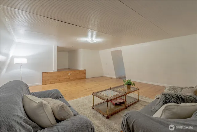 a living room with furniture and a couch