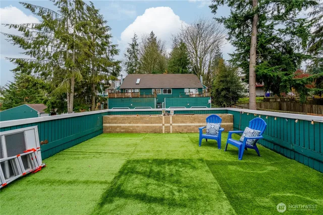 a view of a park with large trees