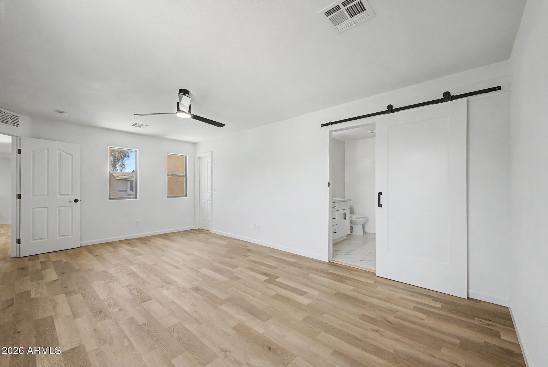 6452 West Ruth Avenue Glendale, AZ 85302 - Photo 21 of 35 a view of an empty room with closet and a window
