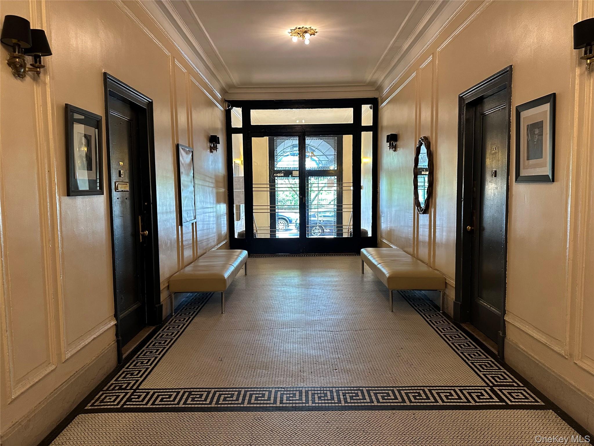 409 Edgecombe Avenue, Unit 7F Manhattan, NY 10032 - Photo 18 of 22 a view of a hallway with a couch