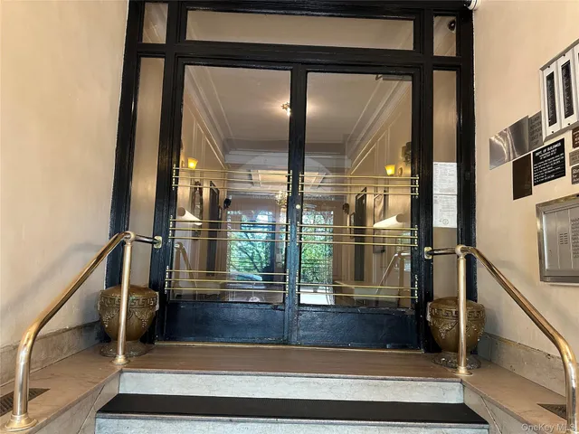 a view of staircase with a rug