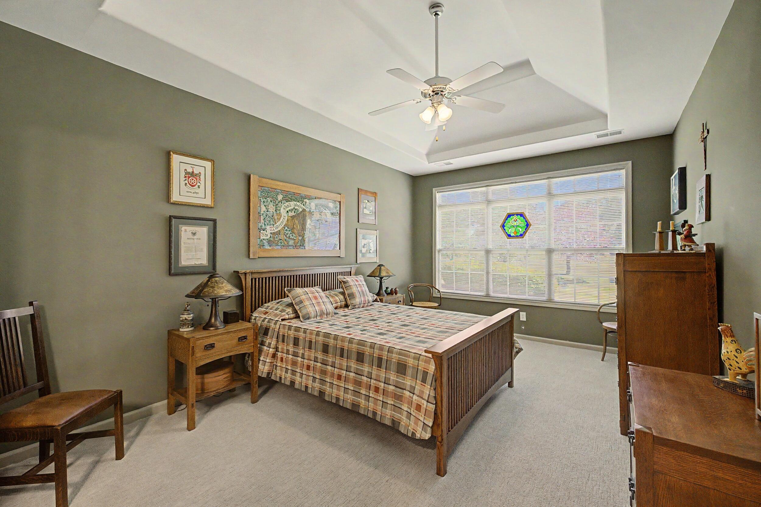 149 Mission Path Georgetown, KY 40324 - Photo 13 of 32 Lovely, spacious primary with window wall to golf course view, tray ceiling, can easily accommodate a king bed