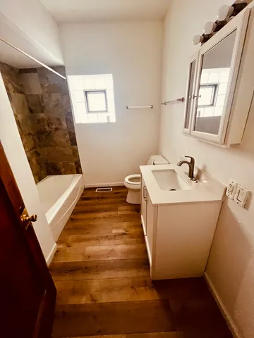 a bathroom with sink and mirror