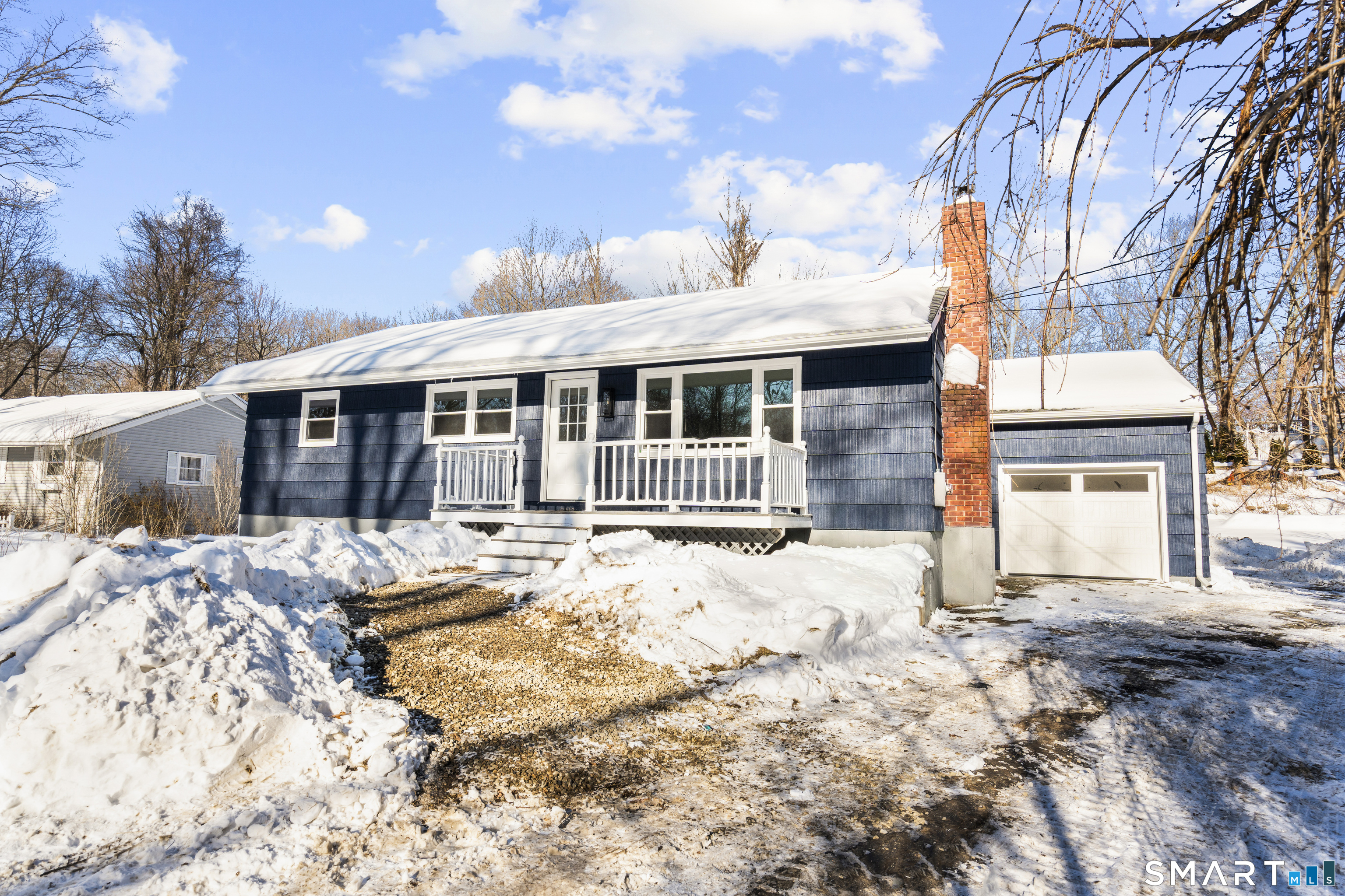122 Lakeside Drive Ridgefield, CT 06877 - Photo 2 of 29 a view of a house with snow on the floor