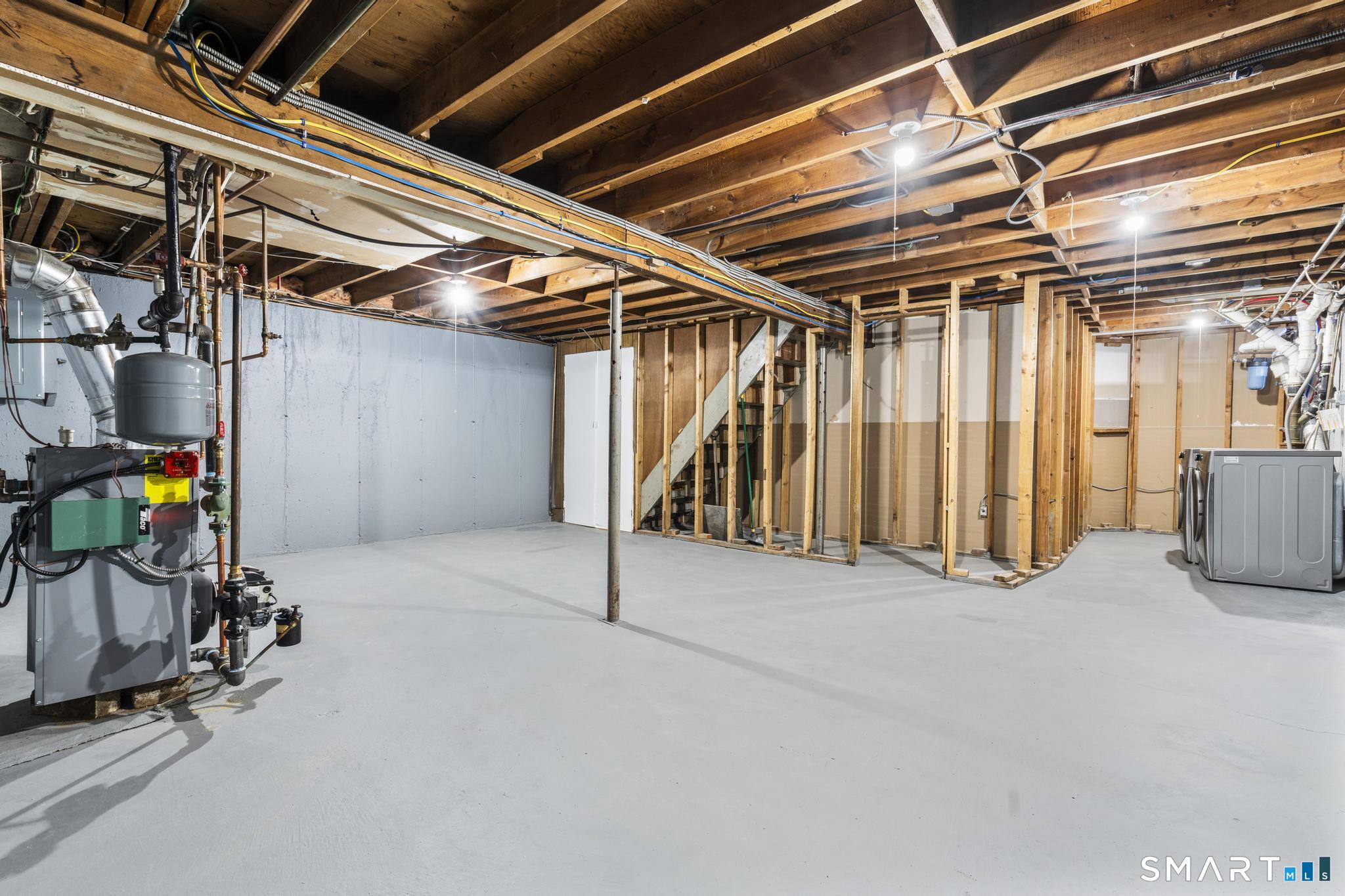 122 Lakeside Drive Ridgefield, CT 06877 - Photo 24 of 29 a view of an empty room with wooden walls