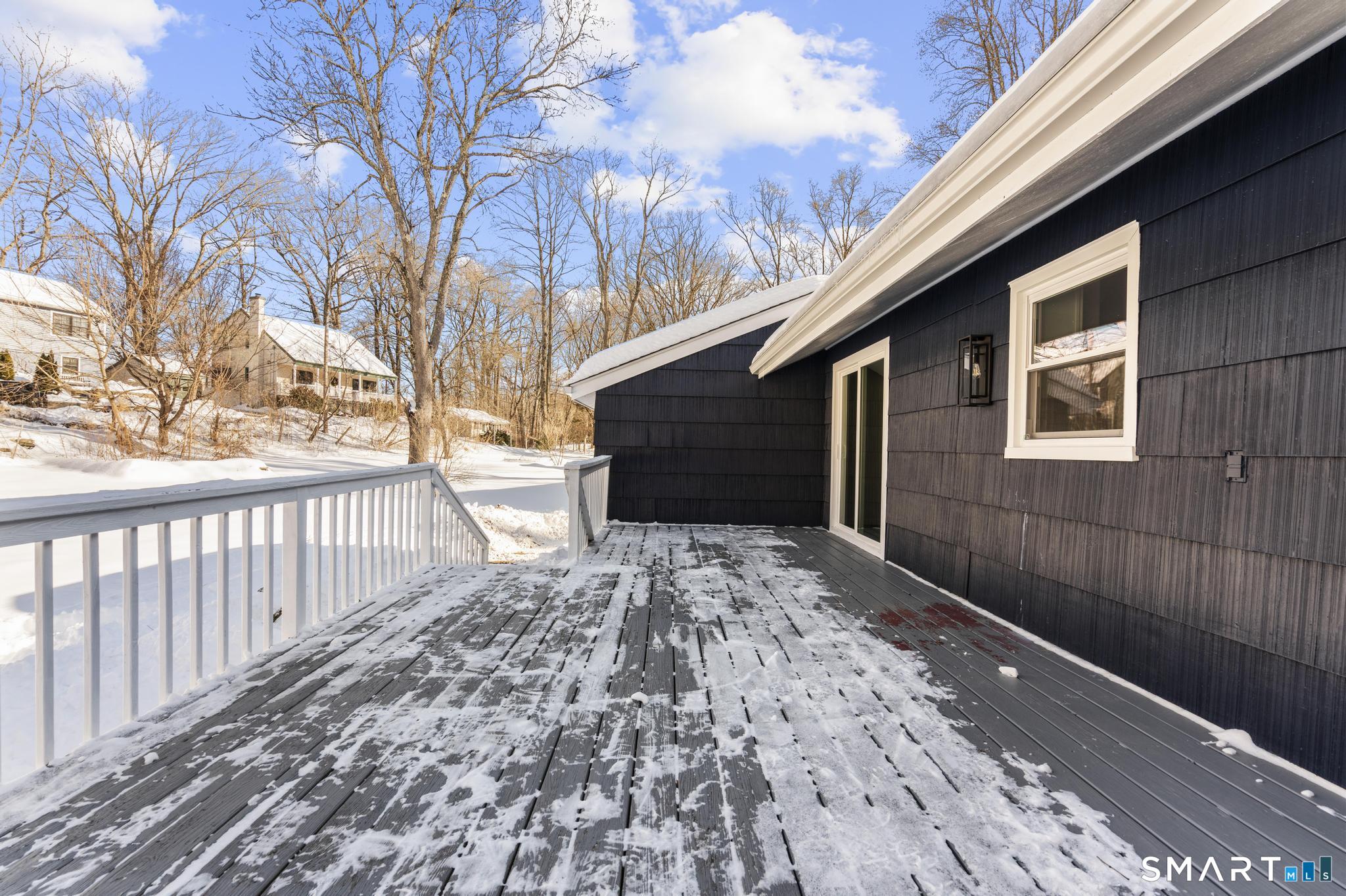 122 Lakeside Drive Ridgefield, CT 06877 - Photo 26 of 29 a view of backyard with wooden fence and large trees