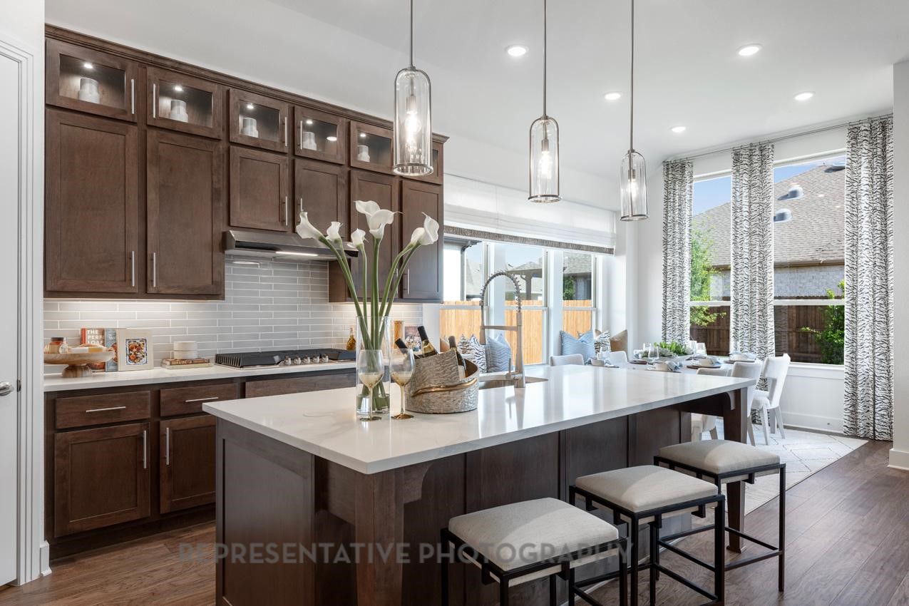 22227 Mount Whitney Road Waller, TX 77484 - Photo 13 of 49 a kitchen with a sink and cabinets