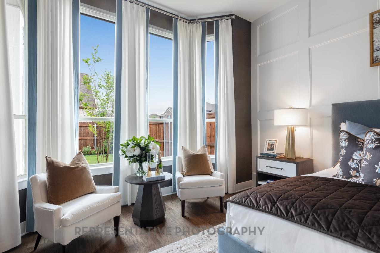 22227 Mount Whitney Road Waller, TX 77484 - Photo 21 of 49 a bedroom with a bed and a couch