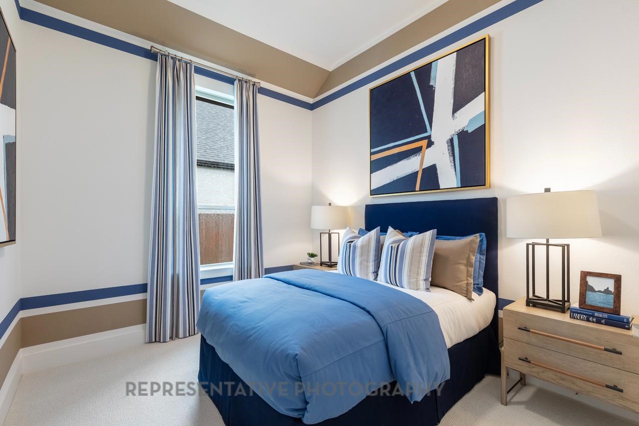 22227 Mount Whitney Road Waller, TX 77484 - Photo 41 of 49 a bedroom with a bed and a window