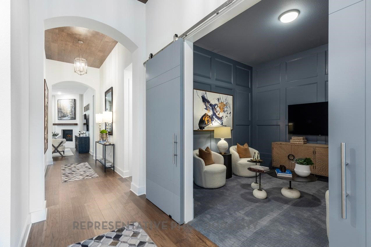 22227 Mount Whitney Road Waller, TX 77484 - Photo 44 of 49 a living room with furniture and a flat screen tv