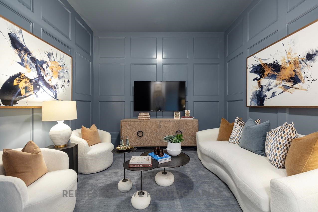 22227 Mount Whitney Road Waller, TX 77484 - Photo 48 of 49 a living room with furniture and a flat screen tv