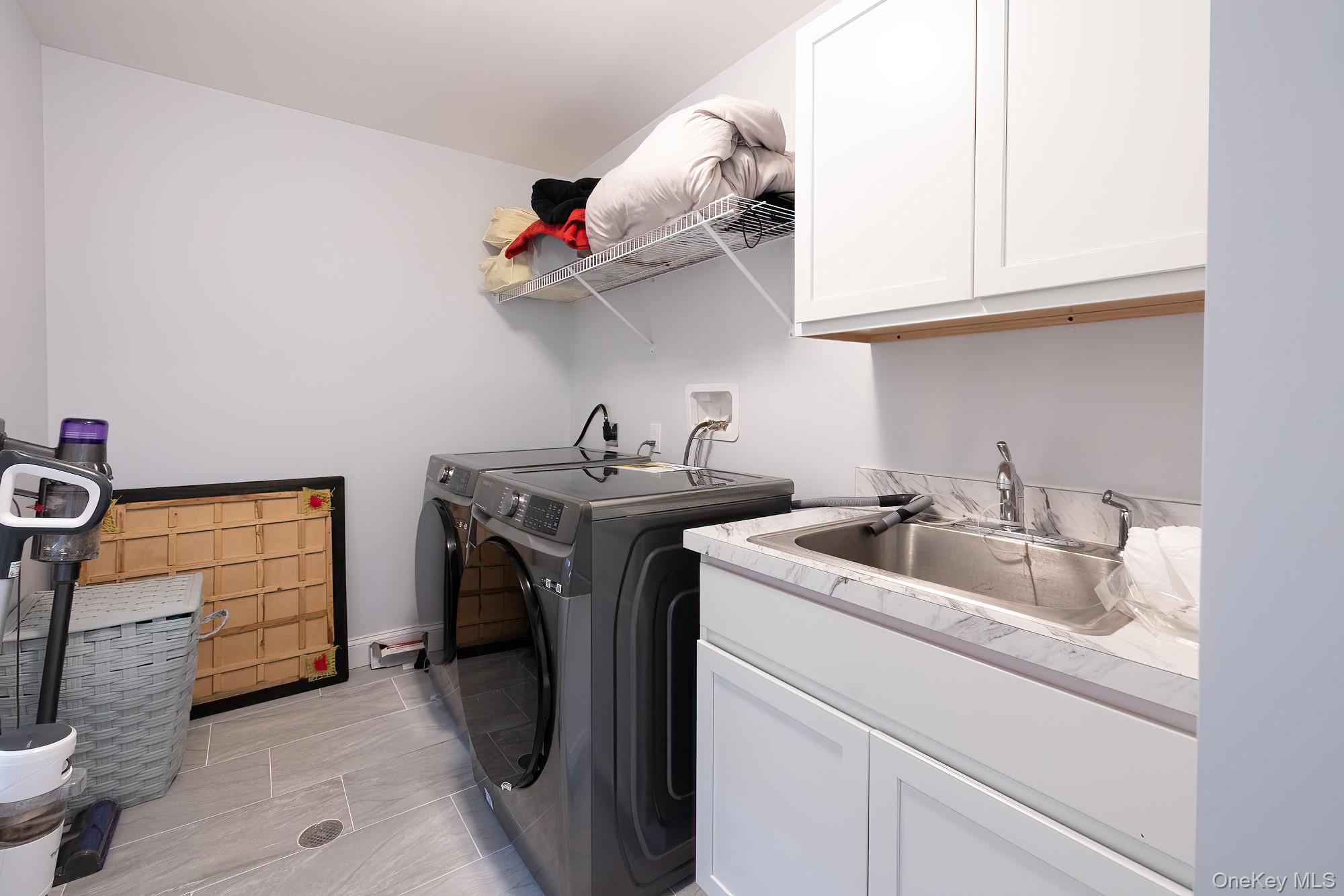 5 Teramar Way White Plains, NY 10607 - Photo 11 of 39 a utility room with dryer and washer