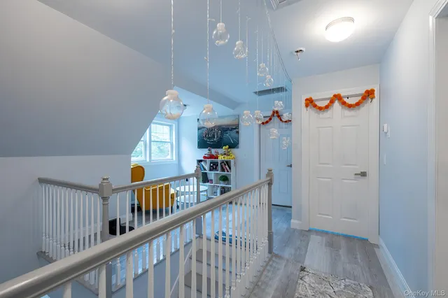 a room with lots of stuff and hardwood floor