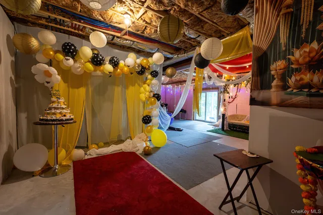 a view of a chairs and table in a room