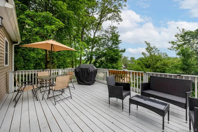 a view of a two chairs in the deck