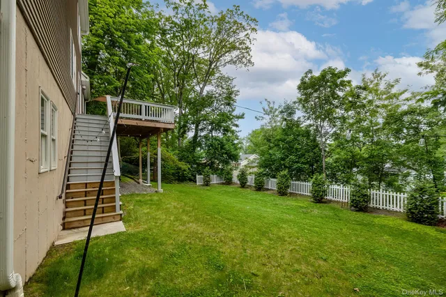 a view of a backyard with a garden and plants