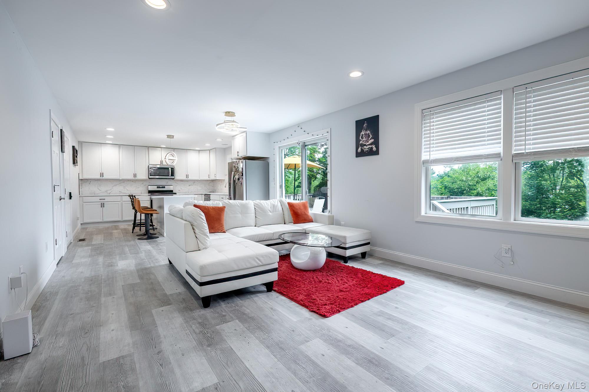5 Teramar Way White Plains, NY 10607 - Photo 8 of 39 a living room with furniture and a table