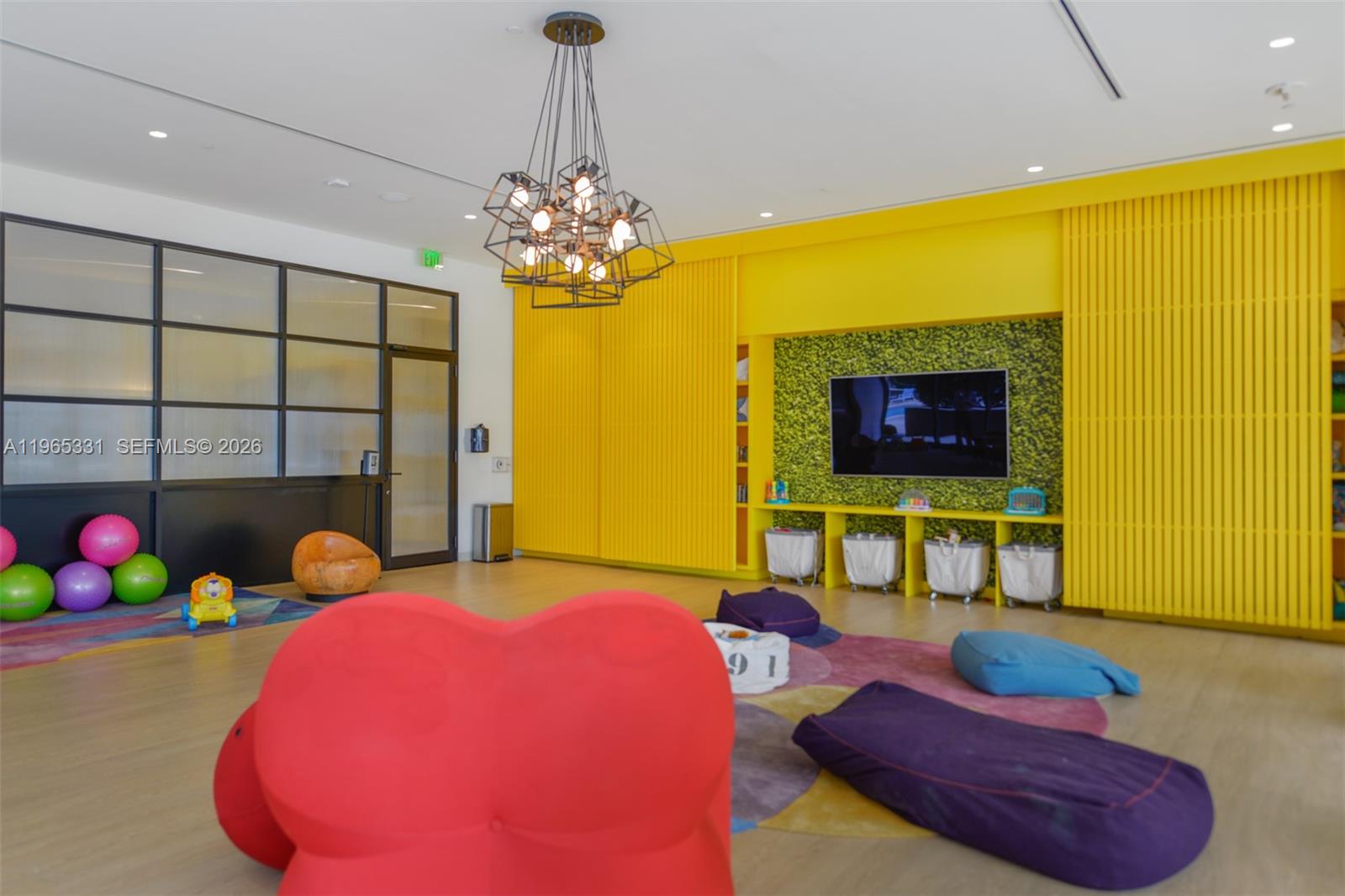 45 Southwest 9th Street, Unit 1107 Miami, FL 33130 - Photo 20 of 50 a bedroom with furniture and a floor to ceiling window