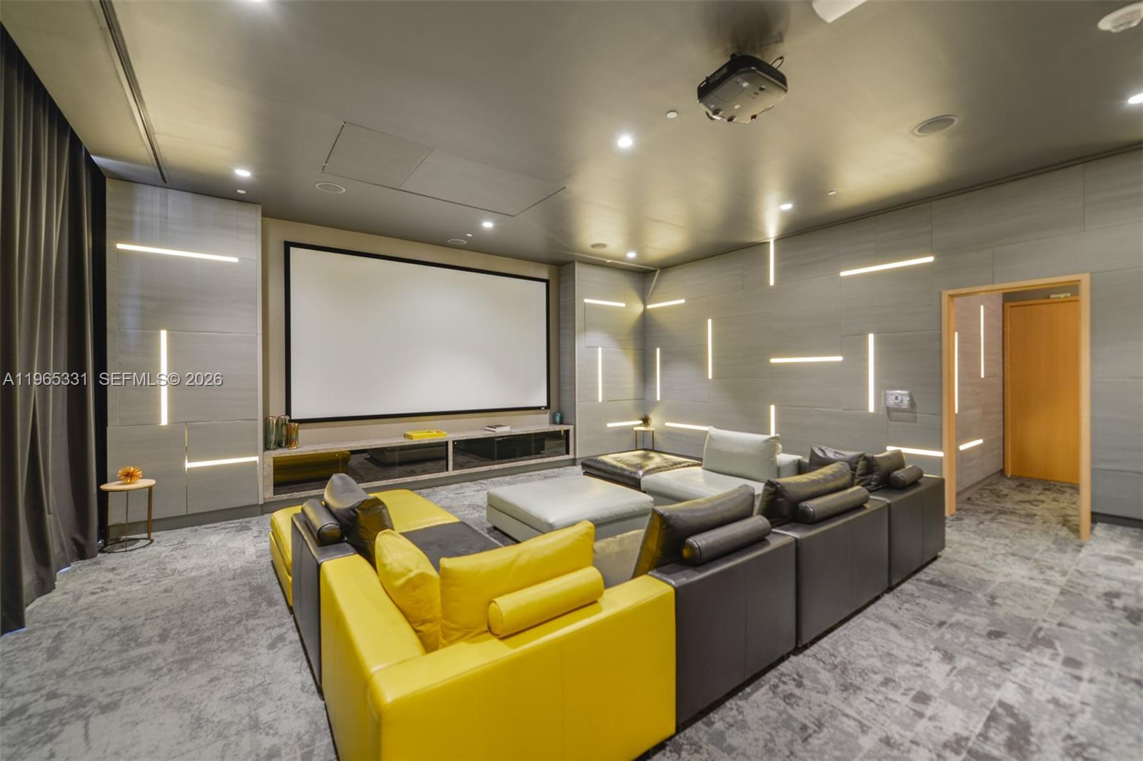 45 Southwest 9th Street, Unit 1107 Miami, FL 33130 - Photo 24 of 50 a projector room with furniture