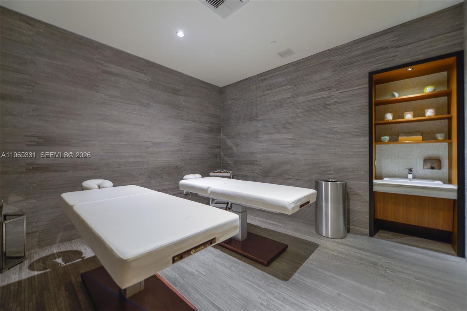 45 Southwest 9th Street, Unit 1107 Miami, FL 33130 - Photo 37 of 50 a en suite bathroom with a toilet sink and mirror